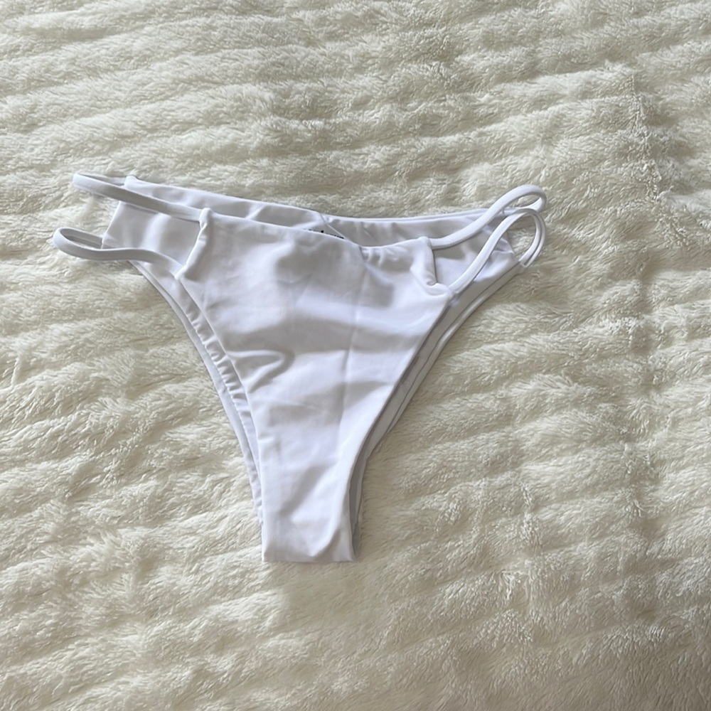 Super down white side cut out bikini bottoms size small!!